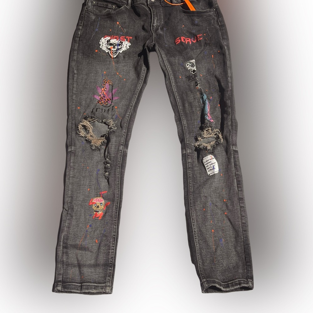 Cooper 9 Men jeans size 34 waist, patched art work.  Practically new.